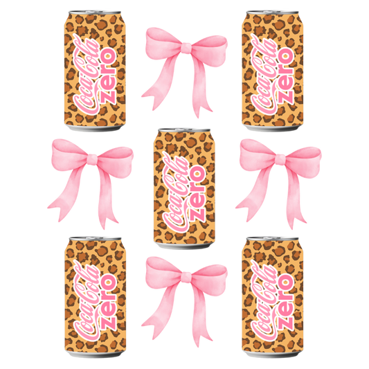 Coca-Cola Zero cans with leopard print and pink bows on a white background