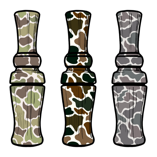 Three camouflaged duck calls on a white background