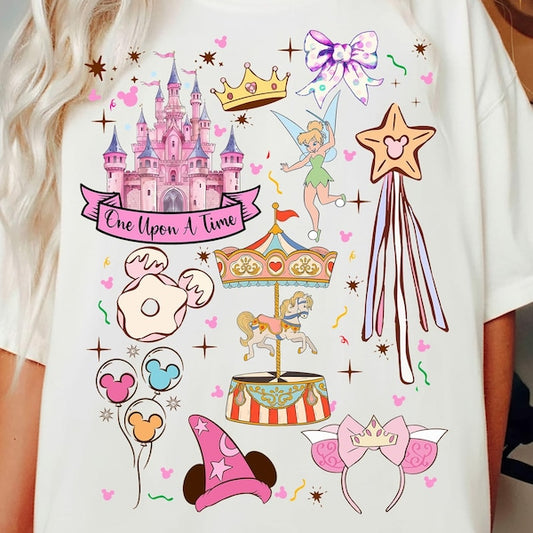 White t-shirt with colorful Disney-themed graphics including a castle, fairy, and carousel.