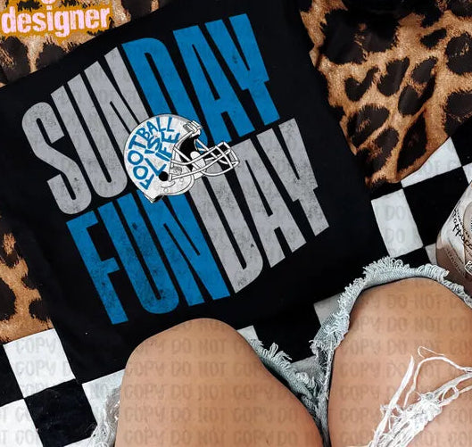 Black pillow with 'Sunday Funday' text on a checkered surface with leopard print and a bottle.